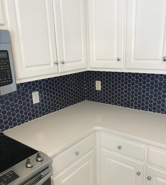 Blue tile backsplash